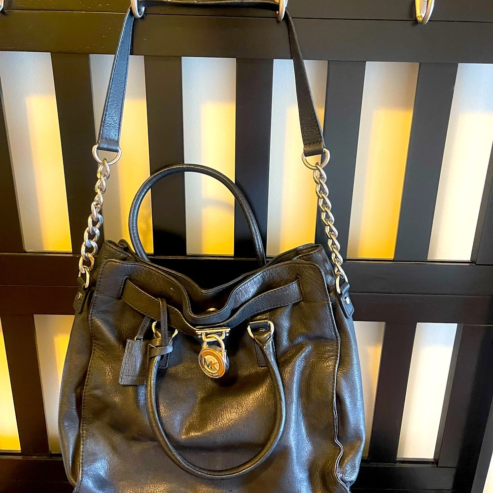 Micheal Korrs Black Leather hand bag.